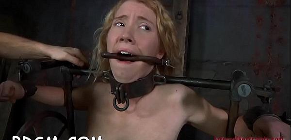  Restrained cutie is made to suffer below hard toy playing